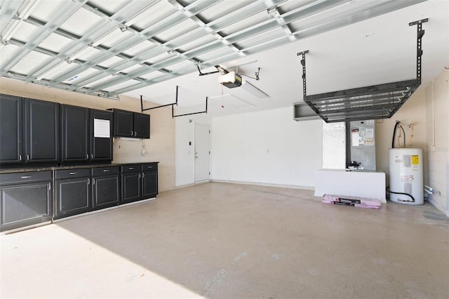 garage with a garage door opener and electric water heater