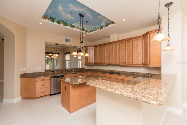 kitchen featuring a raised ceiling, kitchen peninsula, pendant lighting, stainless steel dishwasher, and sink