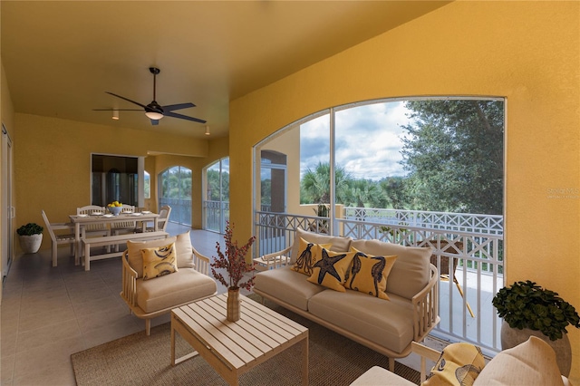 interior space with ceiling fan and plenty of natural light