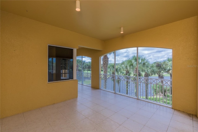 view of tiled spare room