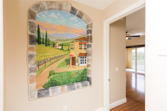 room details featuring ceiling fan and hardwood / wood-style flooring