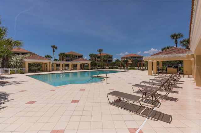 view of swimming pool featuring a gazebo and a patio area