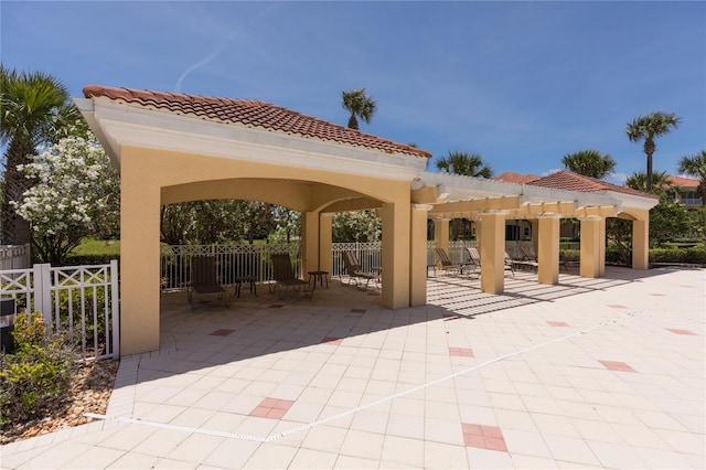 view of home's community with a patio and a pergola