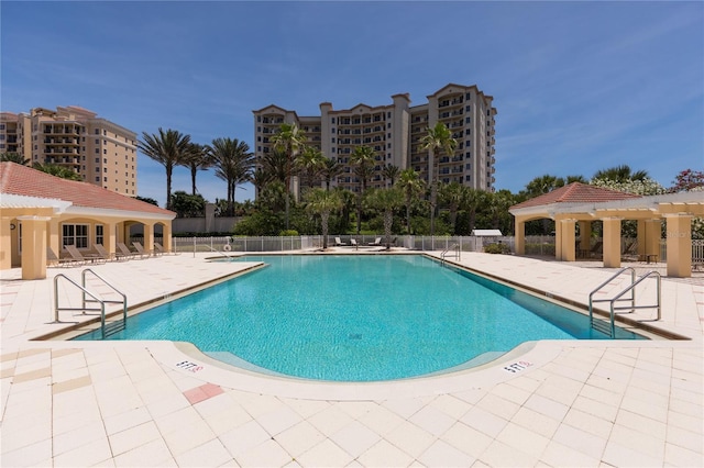 view of pool featuring a patio