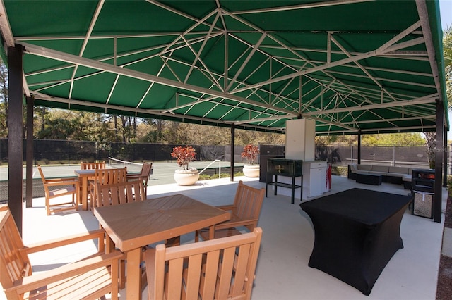 view of patio featuring outdoor lounge area and exterior kitchen