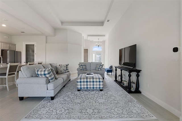 living room featuring a chandelier