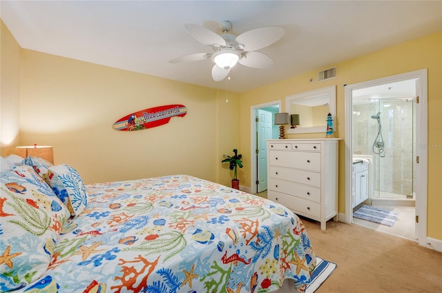 carpeted bedroom featuring connected bathroom and ceiling fan