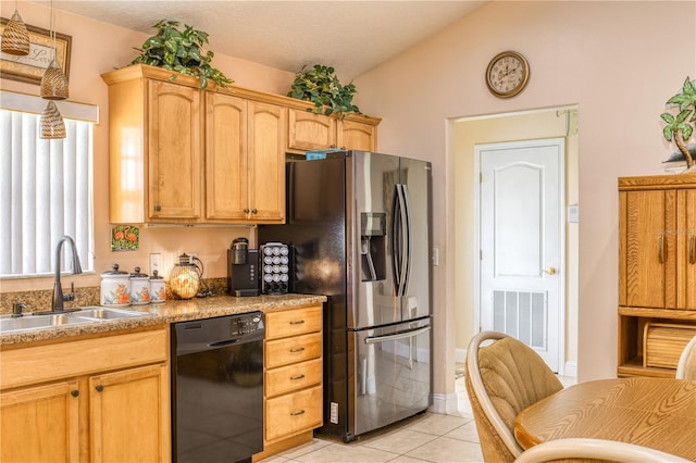 kitchen with light tile patterned floors, dishwasher, vaulted ceiling, sink, and stainless steel refrigerator with ice dispenser