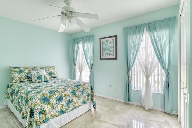 bedroom featuring ceiling fan