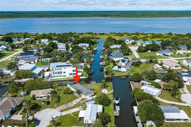 bird's eye view with a water view