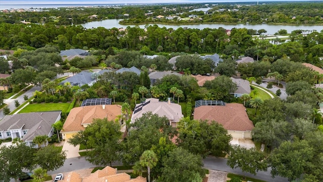 bird's eye view featuring a residential view and a water view