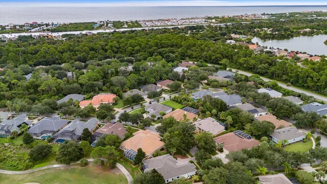 aerial view featuring a residential view and a water view