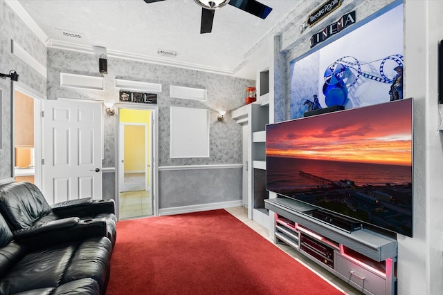 carpeted living room featuring visible vents, a textured ceiling, crown molding, wallpapered walls, and ceiling fan