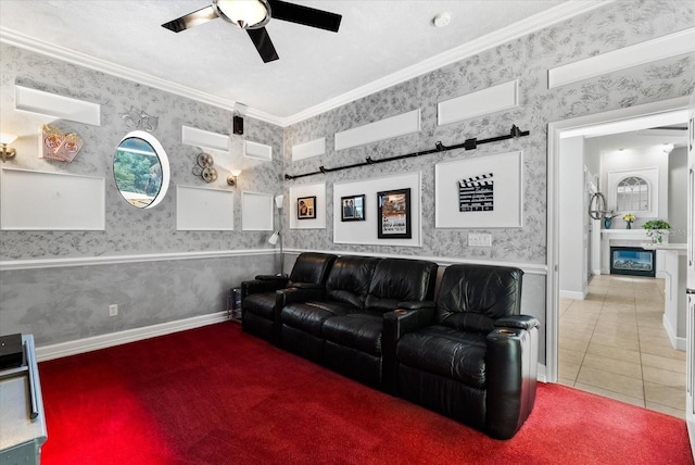 tiled living area with baseboards, ceiling fan, ornamental molding, and wallpapered walls