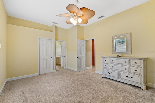 unfurnished bedroom featuring visible vents, light carpet, baseboards, and ceiling fan