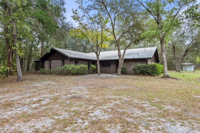 view of front facade with an outbuilding