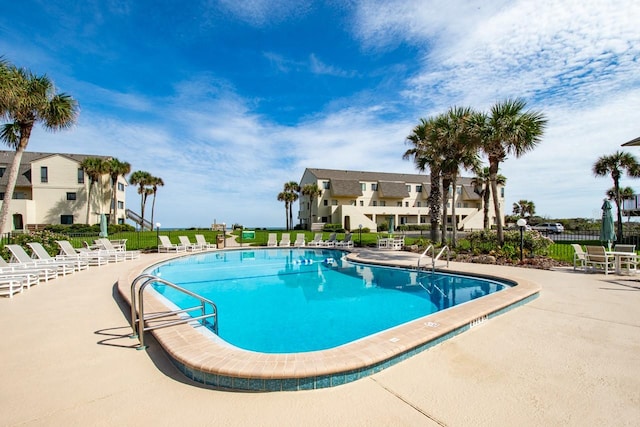 view of pool featuring a patio