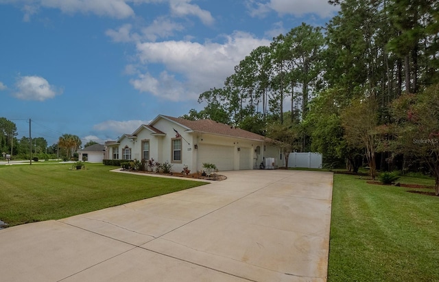 view of front of house with a garage and a front yard