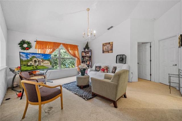 living room featuring a notable chandelier, carpet, and high vaulted ceiling