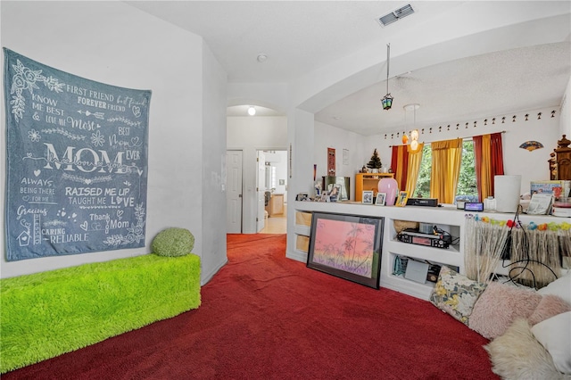 carpeted bedroom with ensuite bathroom