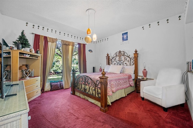 carpeted bedroom featuring a textured ceiling