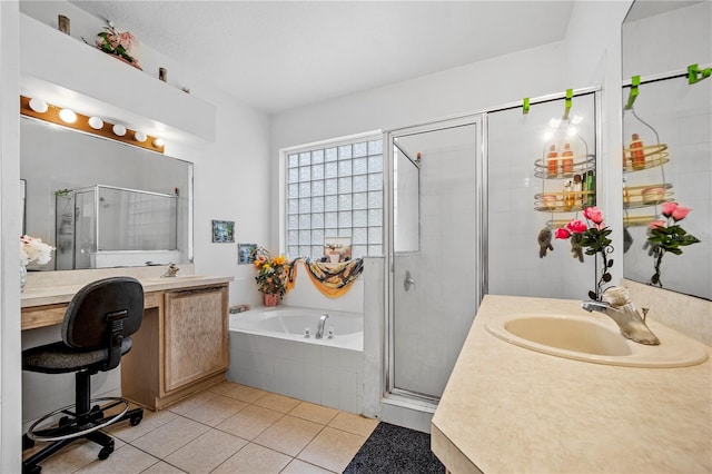 bathroom with vanity, plus walk in shower, and tile patterned floors