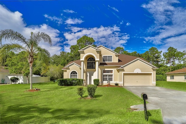 mediterranean / spanish-style house featuring a front lawn