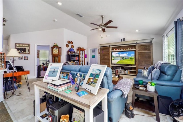 living room featuring lofted ceiling and ceiling fan