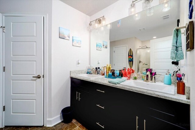 bathroom with vanity and tile patterned floors