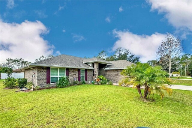 view of front of home with a front yard