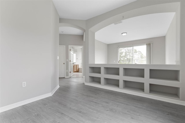 hallway featuring hardwood / wood-style floors