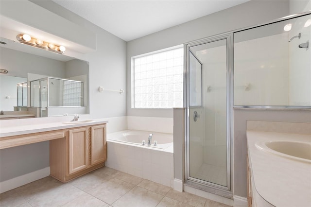 bathroom featuring vanity, tile patterned floors, and plus walk in shower