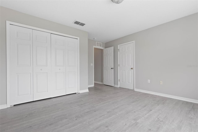 unfurnished bedroom featuring light hardwood / wood-style floors