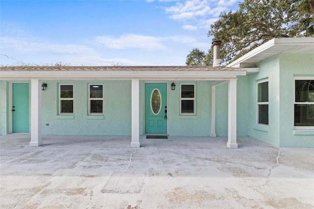 property entrance with a porch