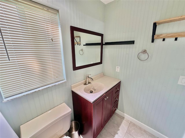 bathroom featuring vanity, toilet, and tile patterned floors