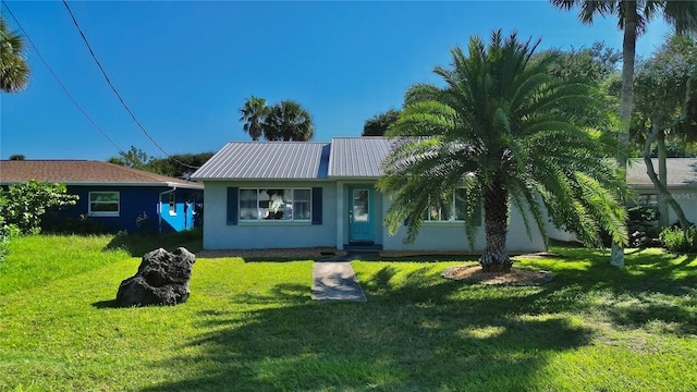 single story home with a front yard