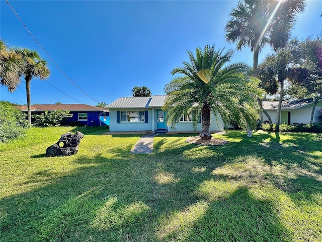 exterior space featuring a front lawn