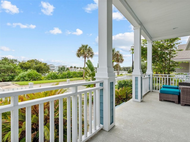 balcony featuring a porch