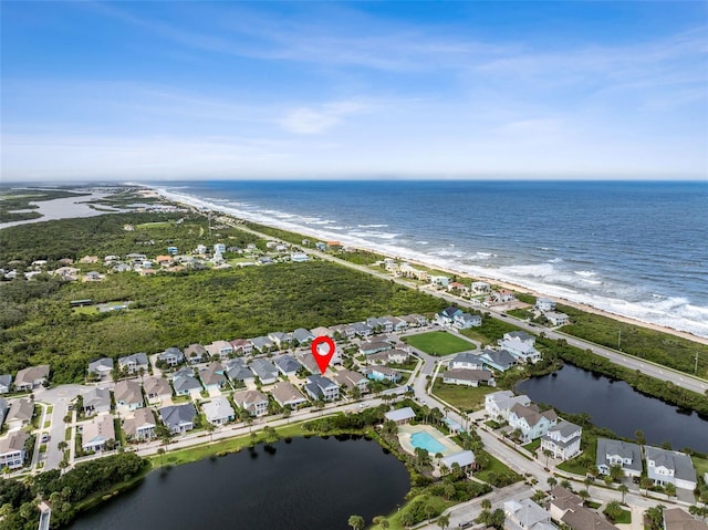 aerial view featuring a water view and a beach view