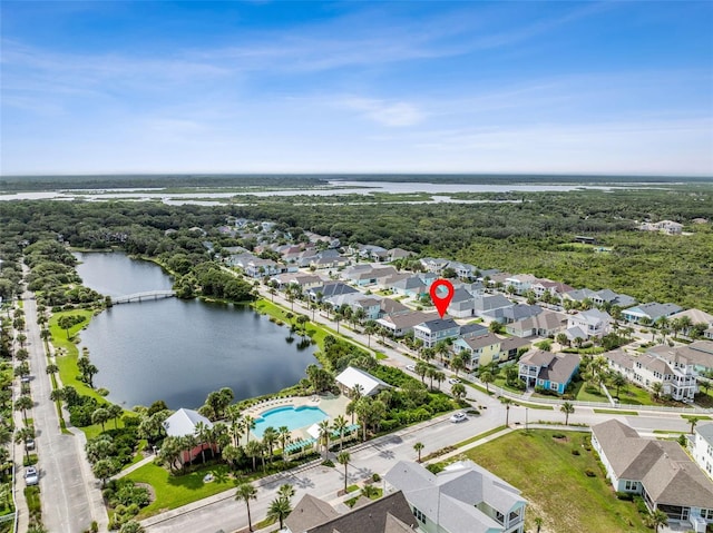 drone / aerial view with a water view