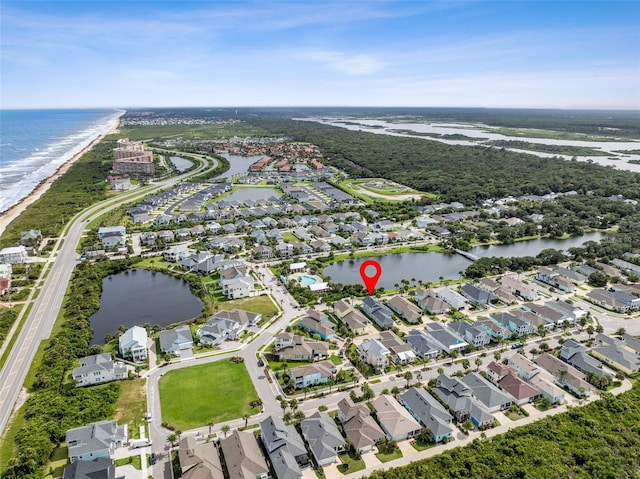 drone / aerial view with a water view