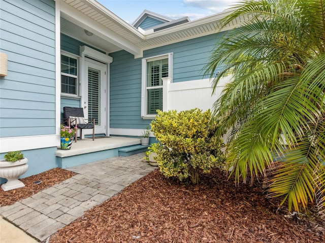 entrance to property with covered porch