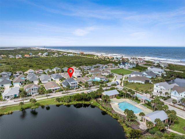 aerial view with a water view and a residential view