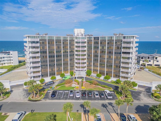 view of building exterior with a water view