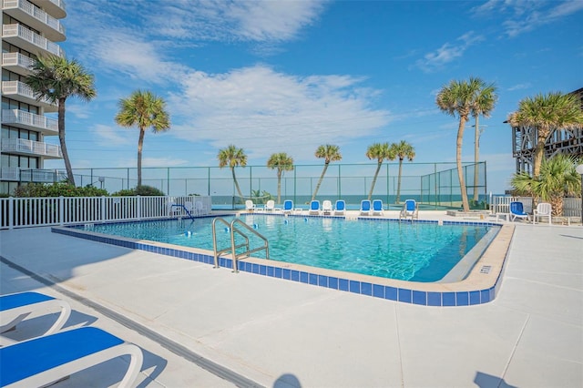 view of pool featuring a patio