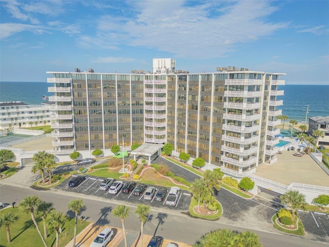 view of building exterior featuring a water view