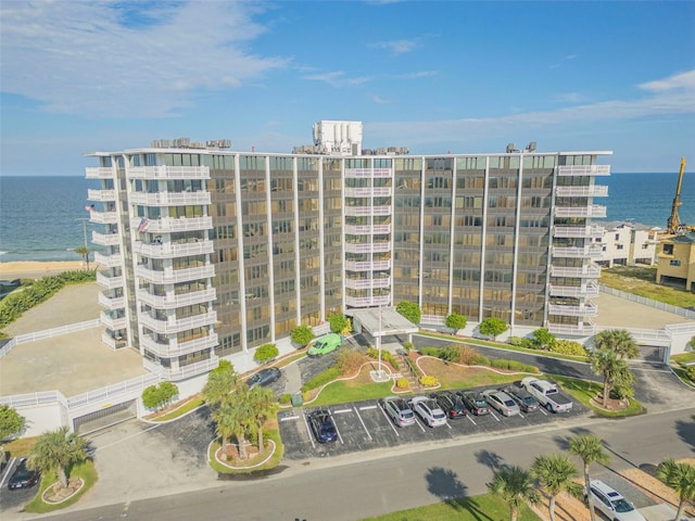 view of property with a water view