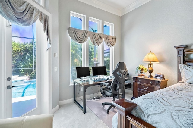 bedroom featuring crown molding, light colored carpet, and multiple windows