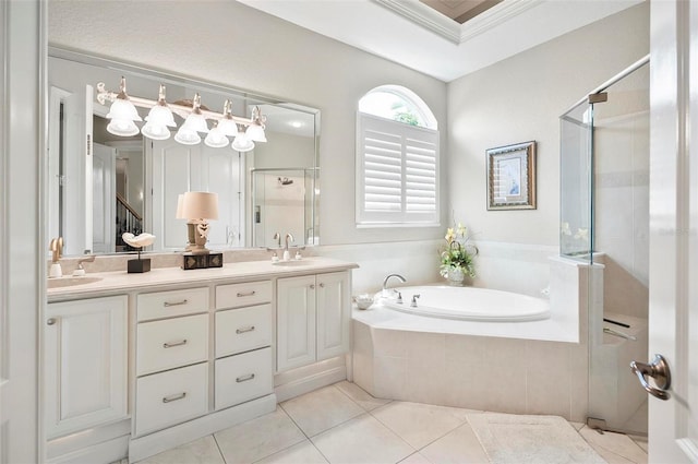 bathroom featuring vanity, ornamental molding, tile patterned floors, and plus walk in shower