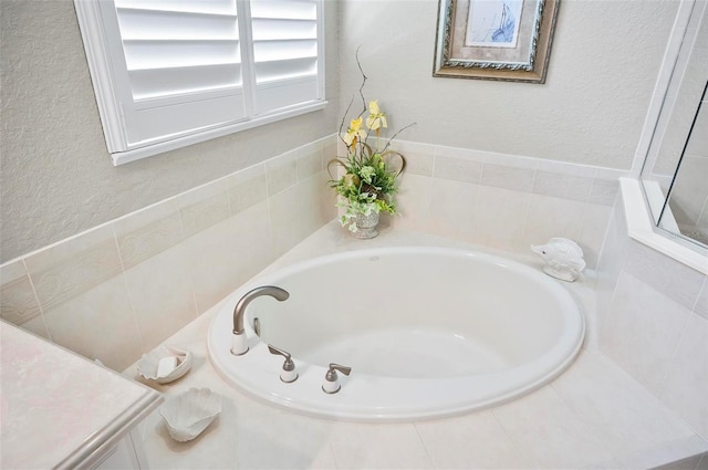 bathroom with a washtub